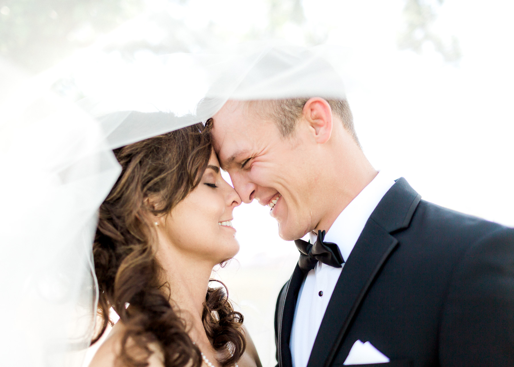 Jake and Beth Anne portrait under veil