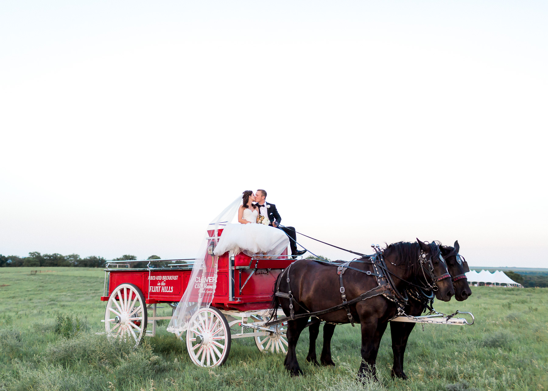 bride and groom in carriage