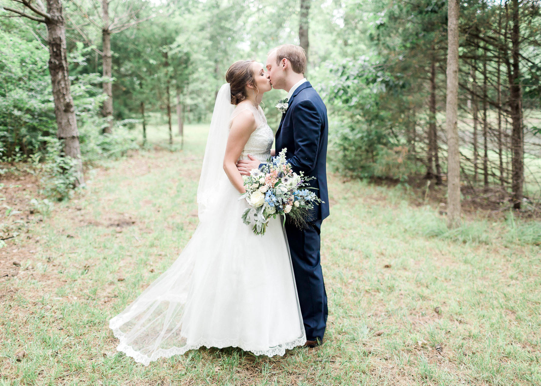 bride and groom kissing