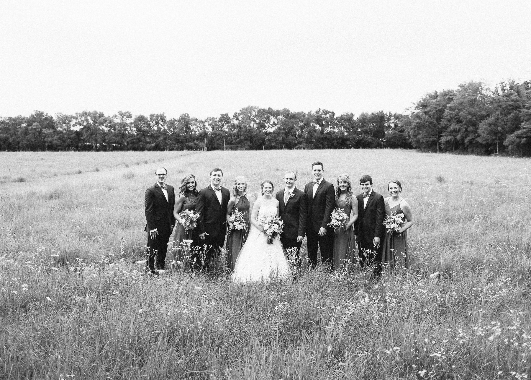 bridesmaids and groomsmen with bride and groom portrait