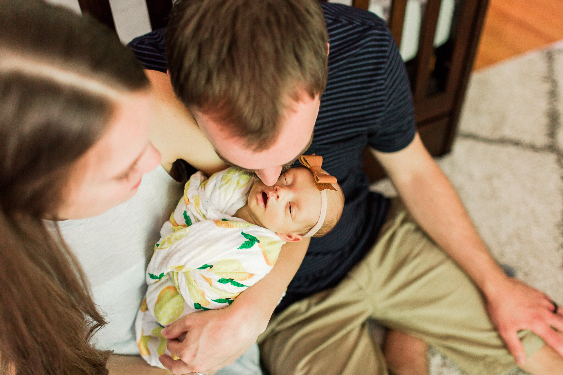 daddy kissing baby